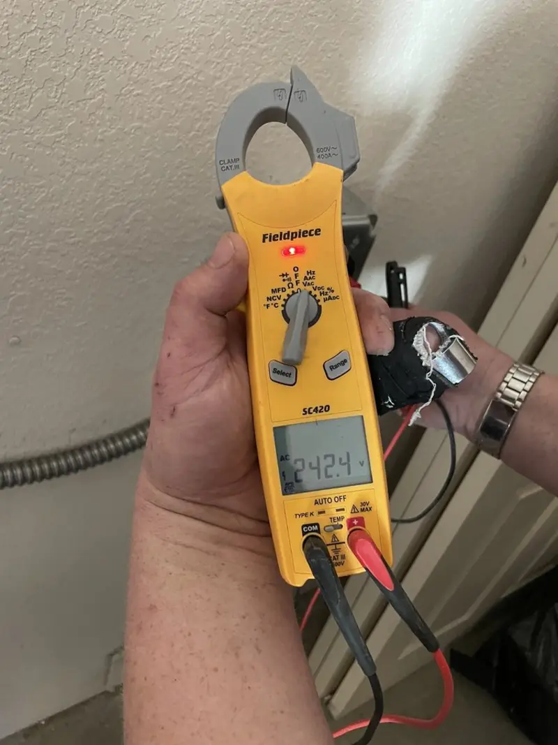 Voltage testing with clamp meter during Generator Installation in Walker